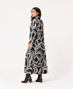 Serenaire Veloria Brush Ring Workwear Dress in Black — three-quarter view