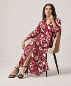 Serenaire Veloria Deco Disc Workwear Dress in Maroon — seated