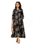 Serenaire Veloria Skeleton Leaf Workwear Dress in Black — front view with bag