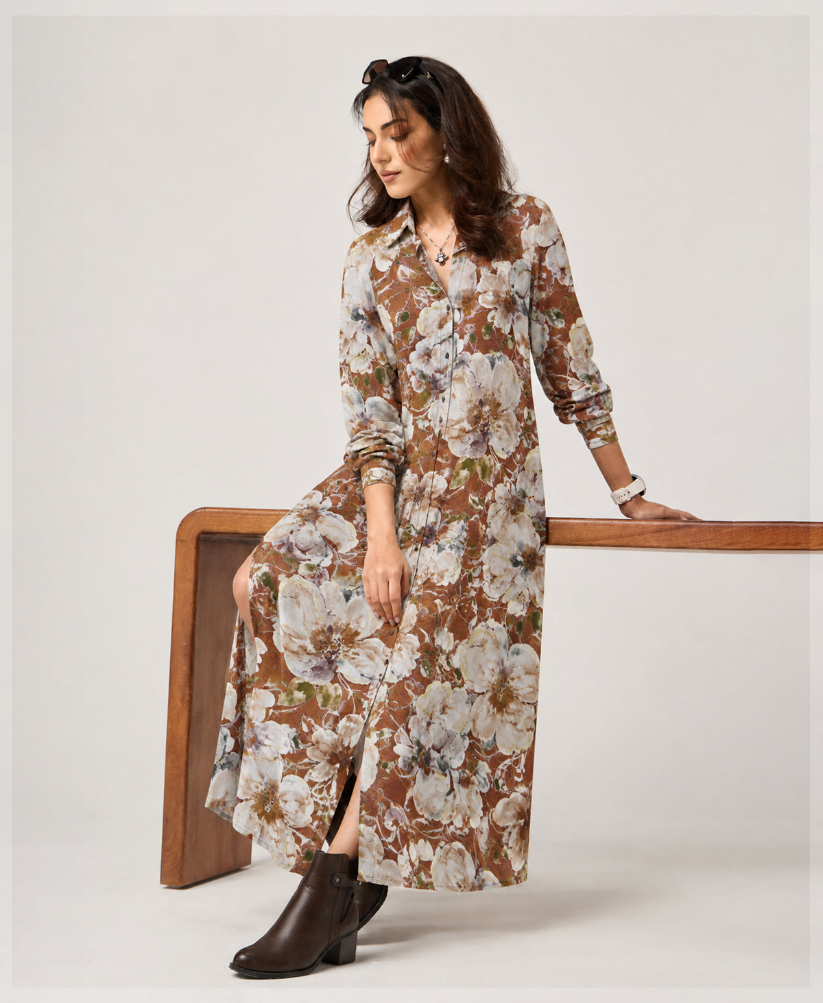 Serenaire Veloria Watercolour Bloom Workwear Dress in Mud — leaning against a table